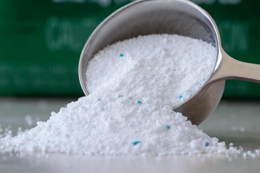dishwasher-detergent-powder-spilled-from-a-scoop-photo Dishwasher Detergent Powder - Image 1